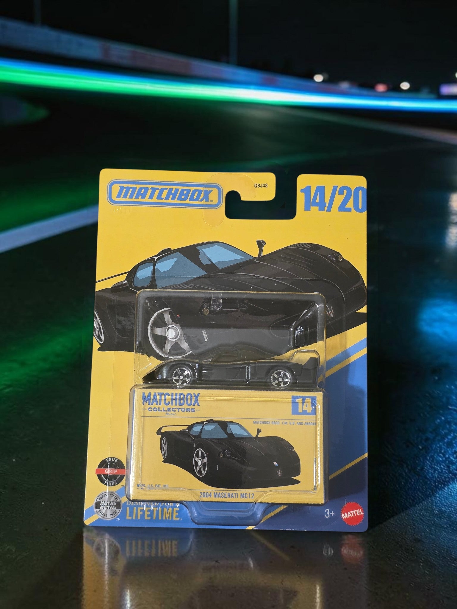 Winters & Johnson Diecast Matchbox Collectors 2004 Maserati MC12 diecast car in original yellow blister packaging