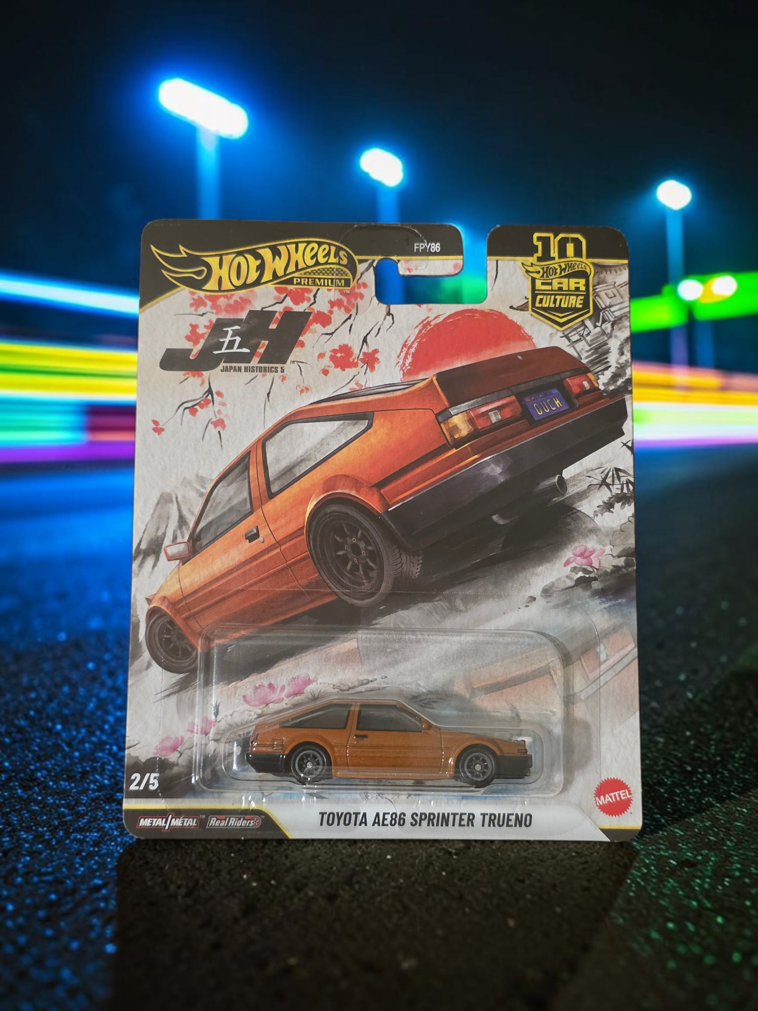 Winters & Johnson Diecast Hot Wheels Premium Toyota AE86 Sprinter Trueno in brown, 1:64 scale diecast car on card.